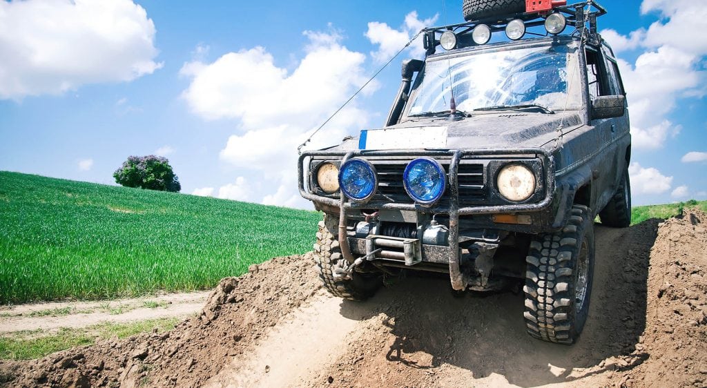 4x4 Offroad through muddy field