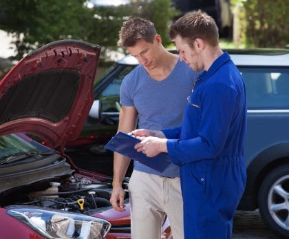 Mechanic doing customer service simple explanation