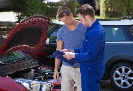 Mechanic doing customer service simple explanation